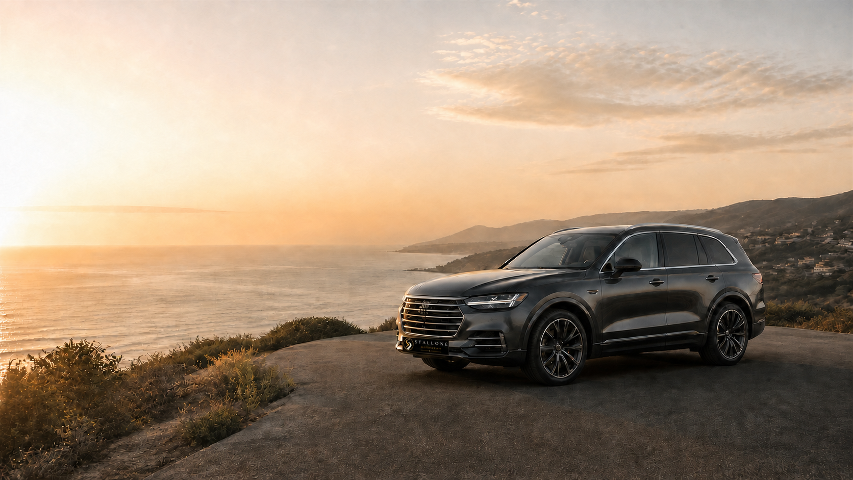 Dark graphite luxury SUV at a Southern California coastal overlook